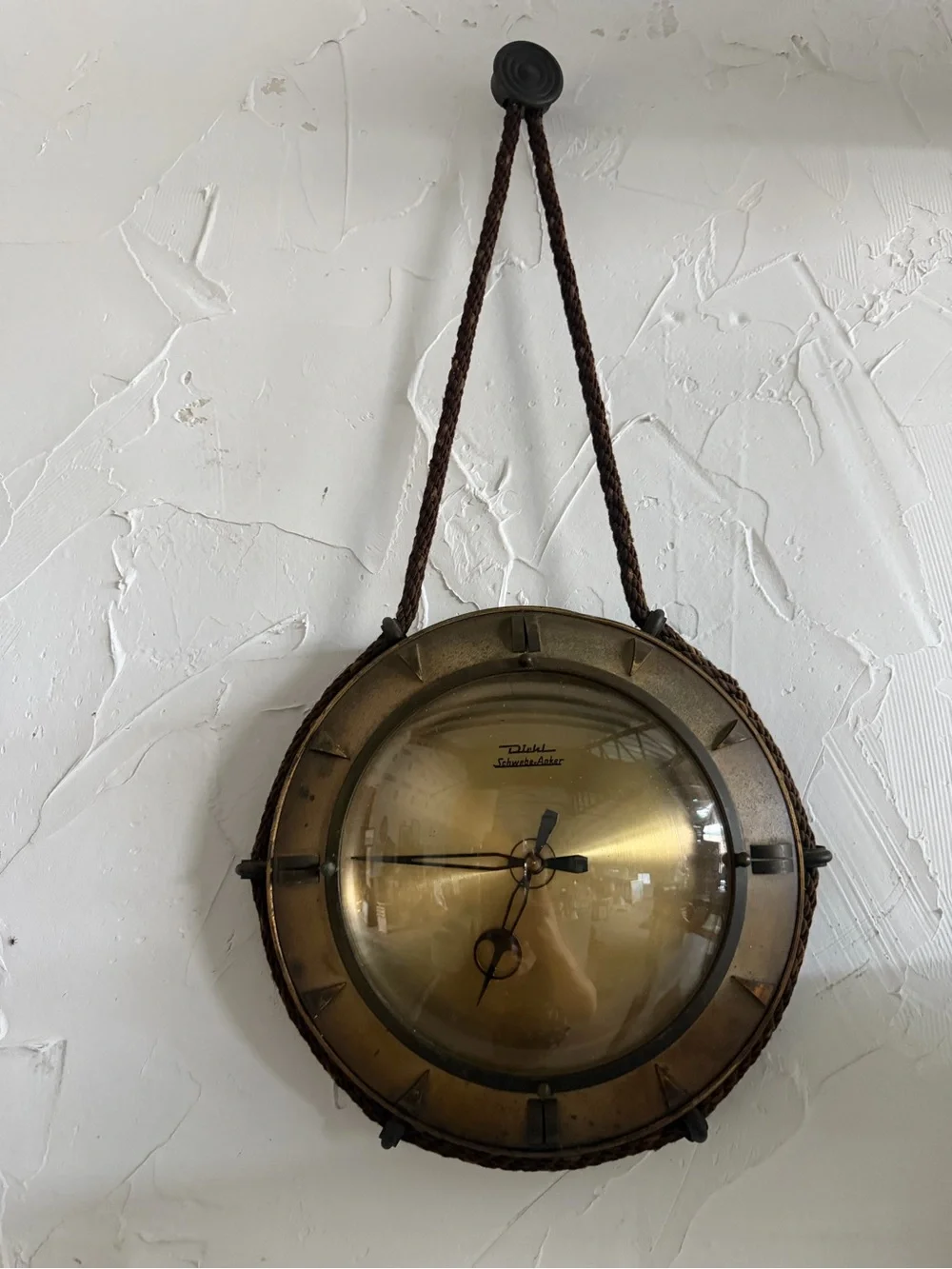 vintage mid-century Diehl brass hanging wall clock featuring a distinctive braid